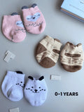 Air Garb baby combo socks for infants 0-1 years; a 6-pair collection arranged in a circle featuring animal faces like pink owl, brown giraffe, and white dog, alongside kitten-themed socks in purple, lime green, and blue.